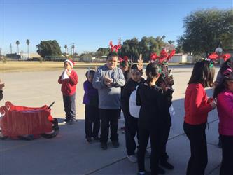 students with reindeer headbands